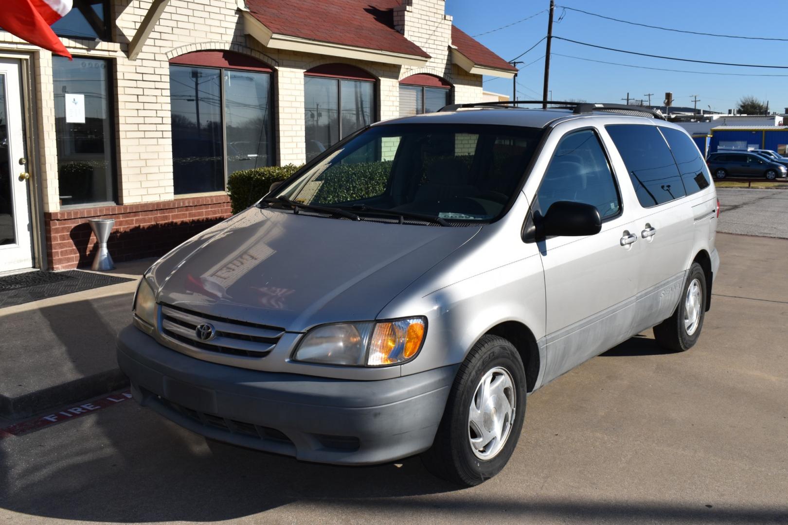 2002 Silver /Gray Toyota Sienna LE (4T3ZF13C42U) with an 3.0L V6 DOHC 24V engine, 4-Speed Automatic Overdrive transmission, located at 5925 E. BELKNAP ST., HALTOM CITY, TX, 76117, (817) 834-4222, 32.803799, -97.259003 - Buying a 2002 Toyota Sienna Van/Minivan can be a practical choice for several reasons: Reliability: Toyota vehicles are renowned for their reliability, and the Sienna is no exception. It's known to have a strong engine and durable construction, which means it can last for many miles with proper m - Photo#1